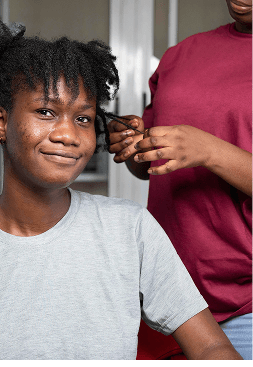 Beauty professional giving facial treatment